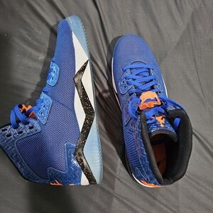 Blue and orange Spike Lee Jordans